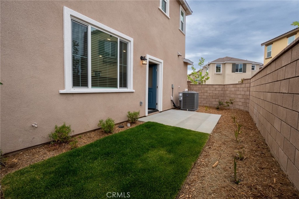 28586 Via Roble Temecula, CA 92591 - Photo 9 of 18 a view of house with yard