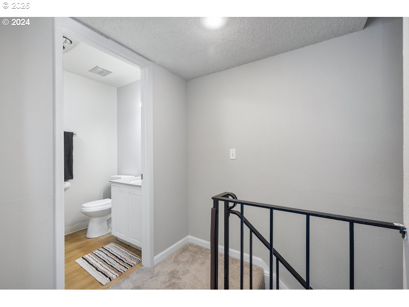 2921 Northeast Rene Avenue, Unit 15B Gresham, OR 97030 - Photo 8 of 22 a bathroom with a toilet