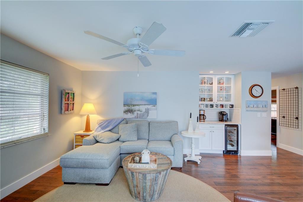 1139 Northwest Fork Road Stuart, FL 34994 - Photo 18 of 43 a living room with furniture and a large window
