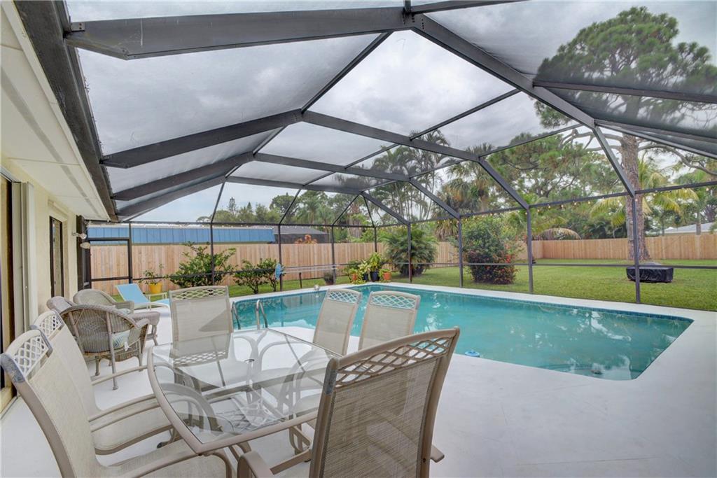 1139 Northwest Fork Road Stuart, FL 34994 - Photo 31 of 43 a view of swimming pool with outdoor seating