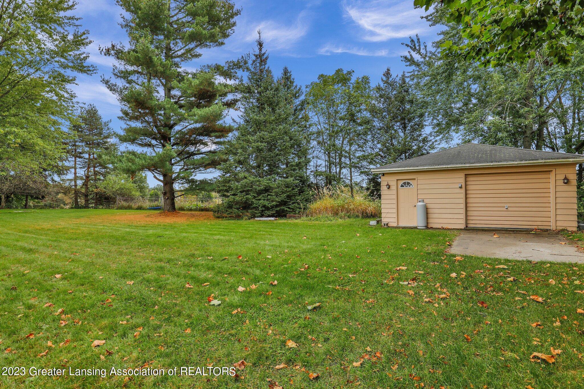 703 Piper Road Haslett, MI 48840 - Photo 38 of 50 31-web-or-mls-Open Ended Media-31