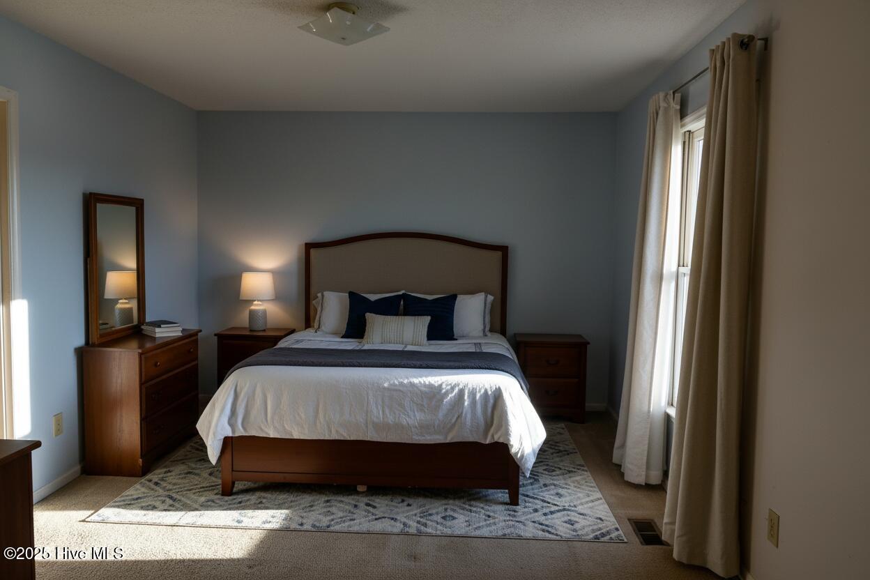 1120 B's Barbeque Road, Unit C Greenville, NC 27834 - Photo 15 of 17 Ai Enhanced Bedroom 1