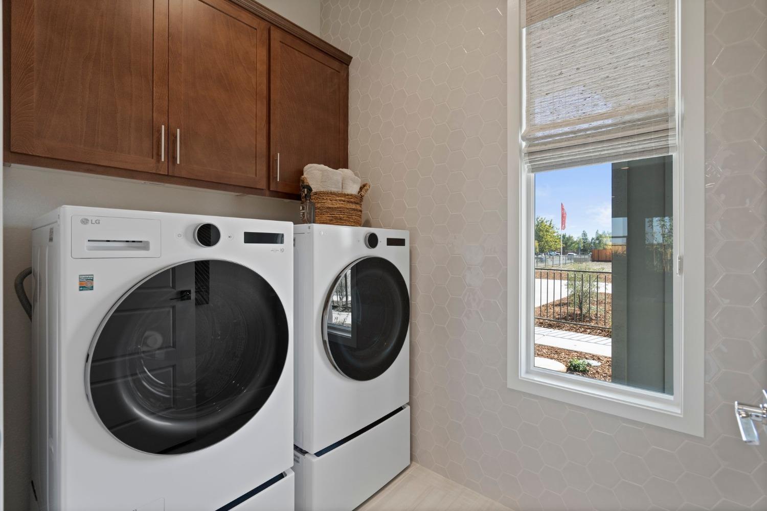 5542 Thomson Loop Davis, CA 95616 - Photo 19 of 63 a utility room with dryer and washer