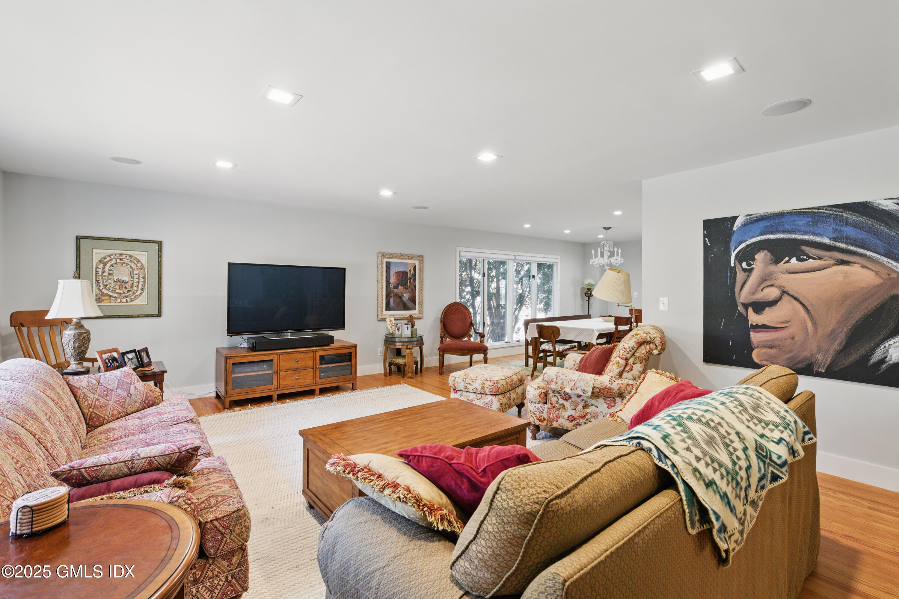 51 Orchard Place Greenwich, CT 06830 - Photo 4 of 18 a living room with furniture and a flat screen tv