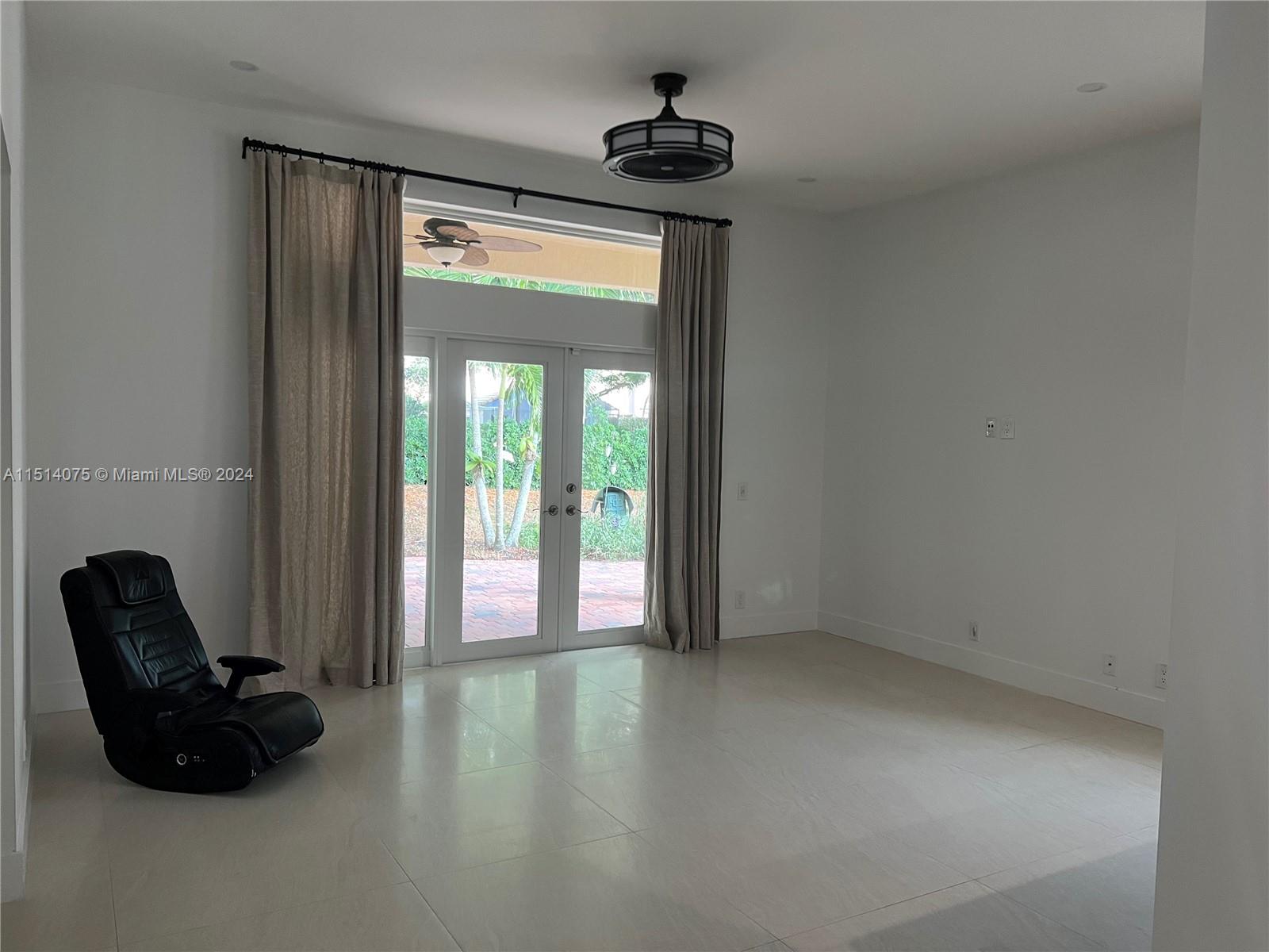 Savanna Weston, FL 33327 - Photo 13 of 26 a view of livingroom with furniture and windows