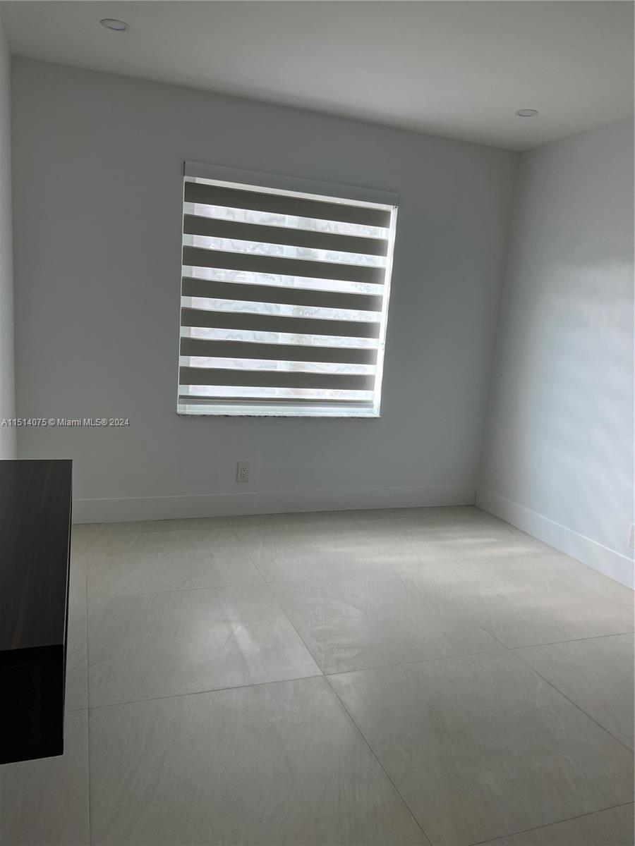 Savanna Weston, FL 33327 - Photo 19 of 26 a view of an empty room with a window