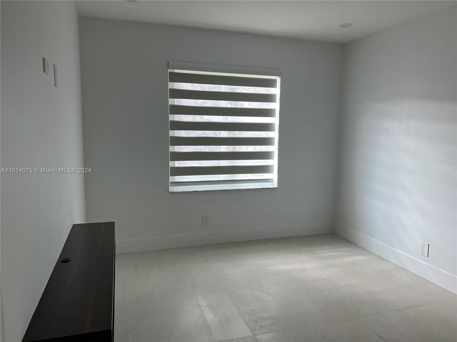 Savanna Weston, FL 33327 - Photo 21 of 26 a view of an empty room with a window