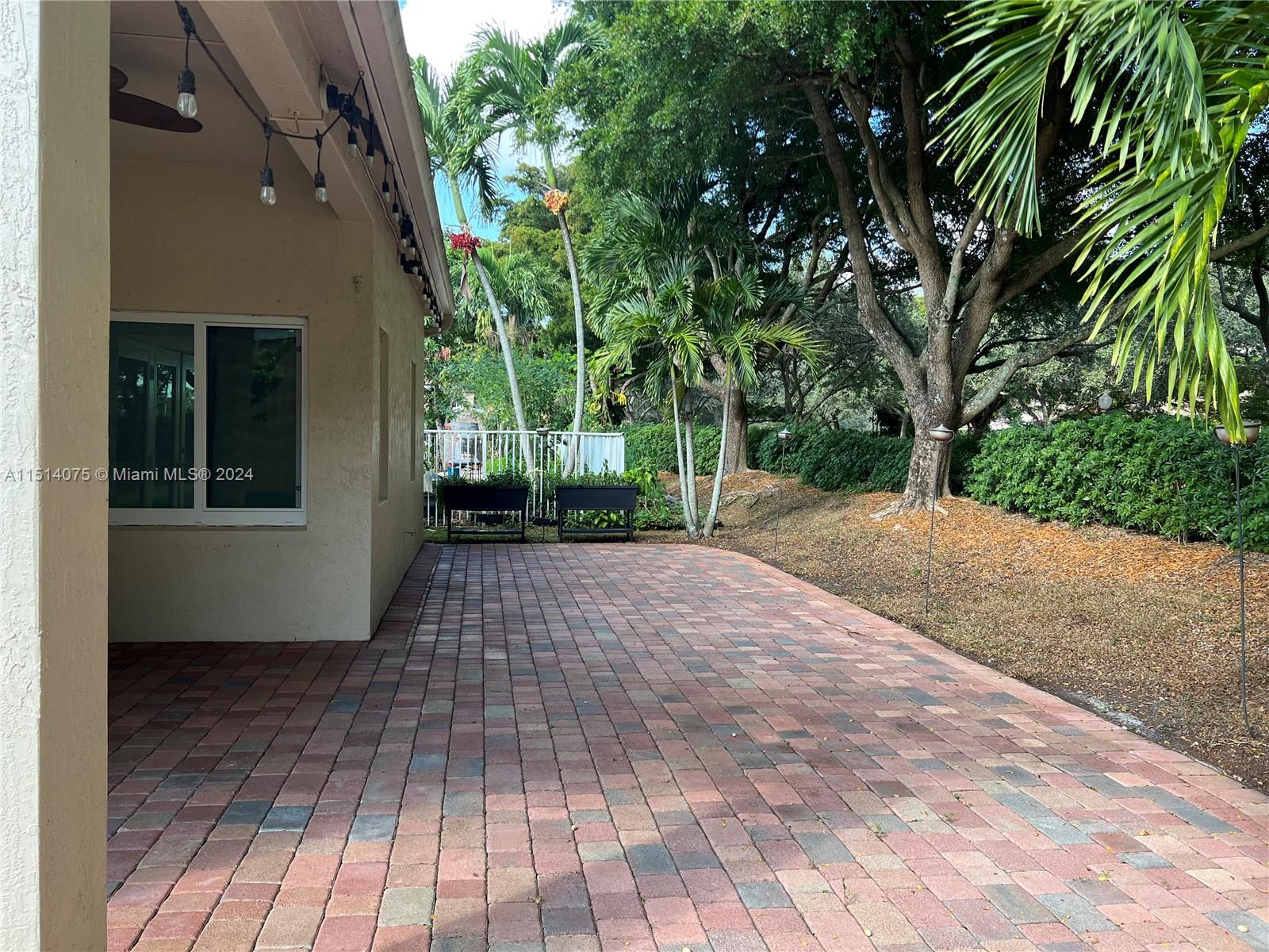 Savanna Weston, FL 33327 - Photo 22 of 26 a view of a backyard of the house