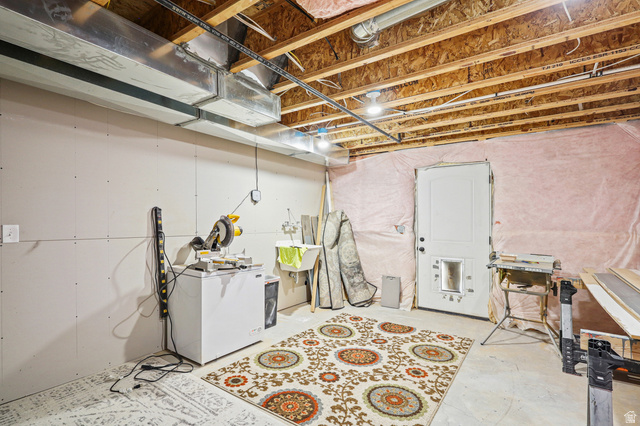 1588 West Rim Rock Drive Stockton, UT 84071 - Photo 34 of 61 Unfinished basement space featuring exposed wood joists and visible ductwork