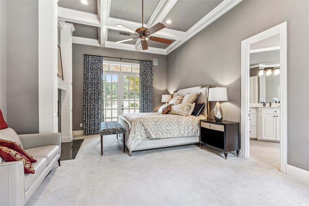 1815 West Forest Grove Road Lucas, TX 75002 - Photo 13 of 40 Carpeted bedroom featuring coffered ceiling, access to exterior, french doors, crown molding, and beamed ceiling