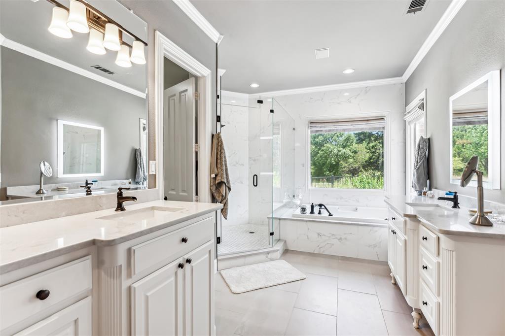 1815 West Forest Grove Road Lucas, TX 75002 - Photo 15 of 40 Bathroom featuring a marble finish shower, vanity, and crown molding