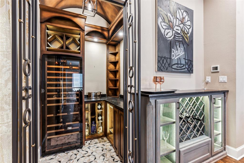 1815 West Forest Grove Road Lucas, TX 75002 - Photo 24 of 40 Wine area featuring a dry bar, baseboards, and wine cooler