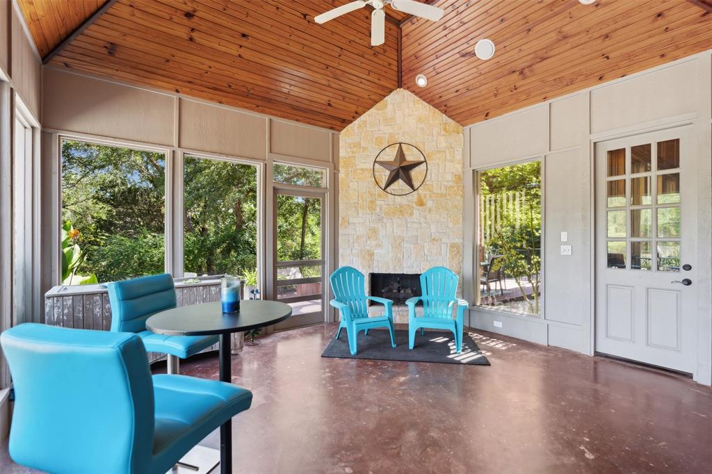1815 West Forest Grove Road Lucas, TX 75002 - Photo 35 of 40 Sunroom with a ceiling fan, vaulted ceiling, and wood ceiling