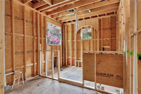 a view of a balcony with wooden walls