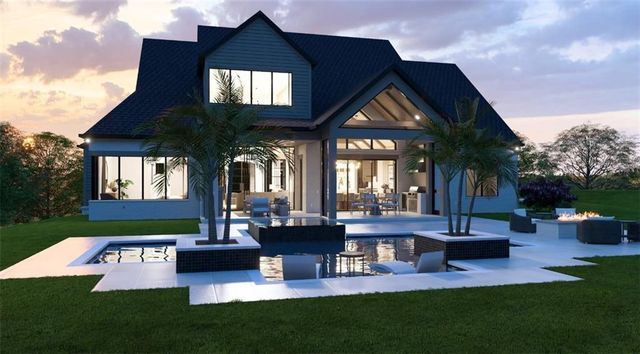 a front view of house with yard and outdoor seating