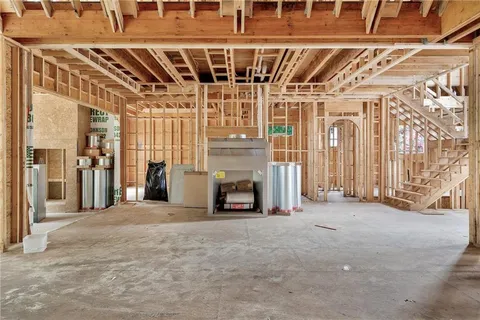 a view of a room with wooden walls