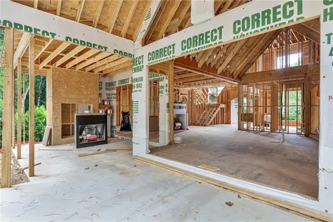 a view of a room with wooden walls
