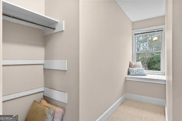 a view of small space with racks on the wall