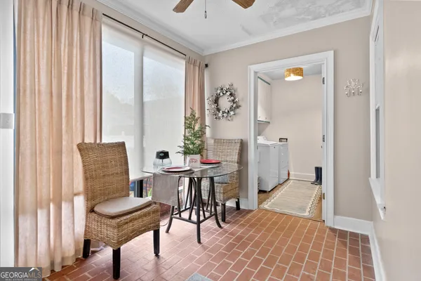 a view of a livingroom with furniture and window