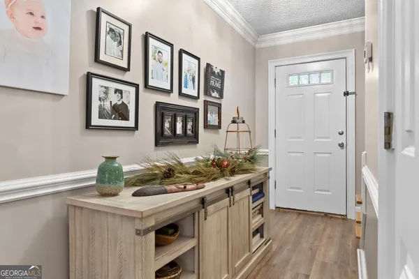 a kitchen with stainless steel appliances a stove and a refrigerator