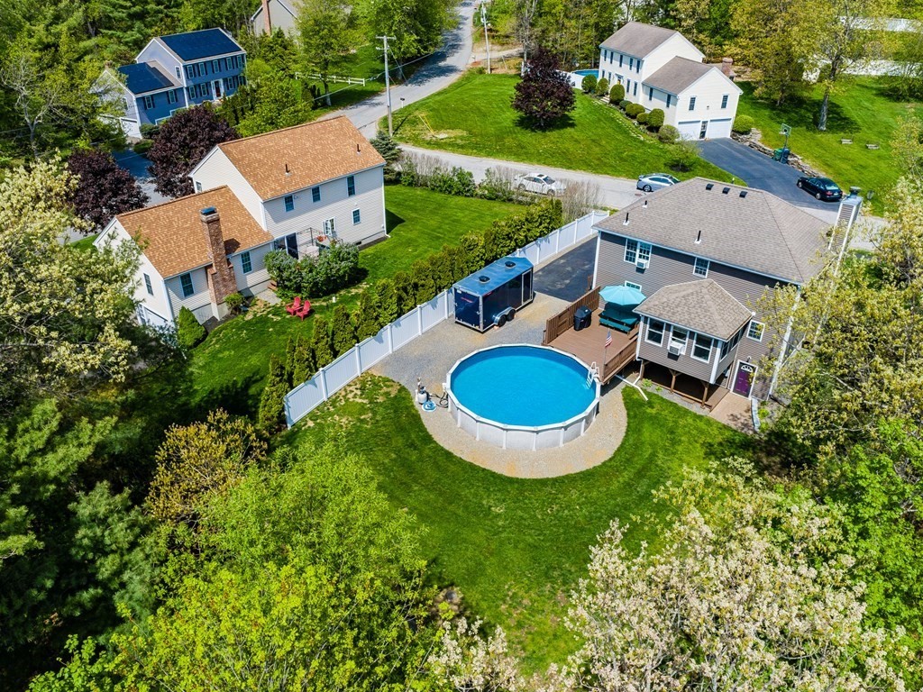 4 Haven Hill Road Rutland, MA 01543 - Photo 4 of 37 an aerial view of a house with garden space and swimming pool