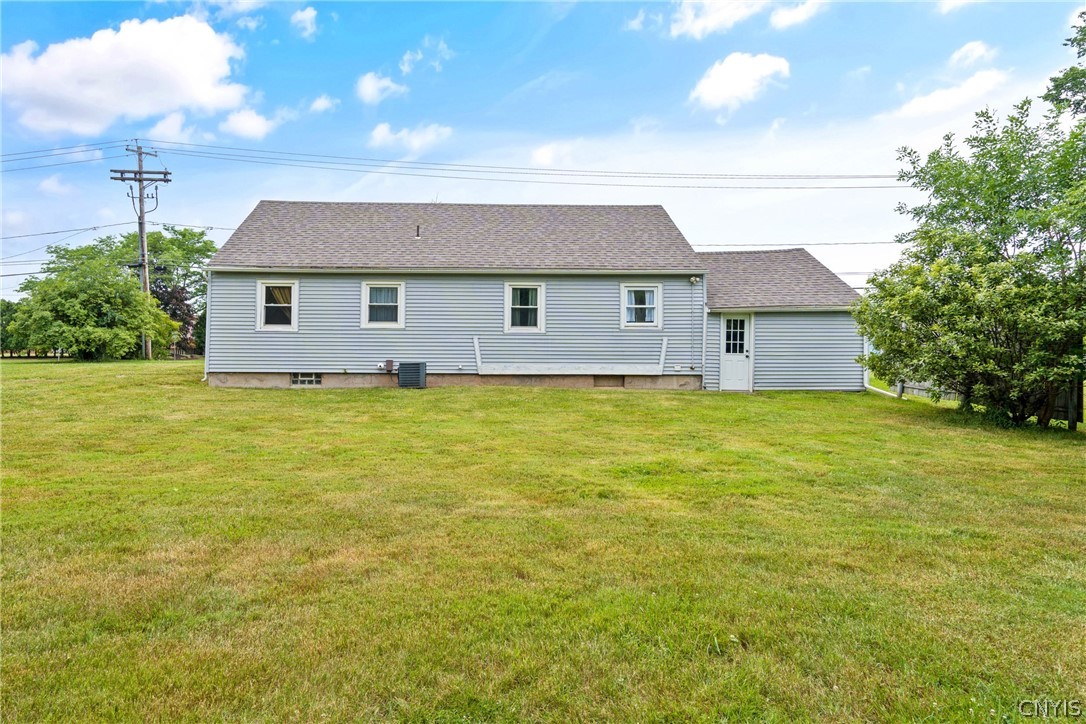 6130 South Bay Road Cicero, NY 13039 - Photo 24 of 30 Now outside in this lush .43 acre lot, we can explore all this sprawling grass space that is large enough to add a pool, patio, gazebo - anything you desire!