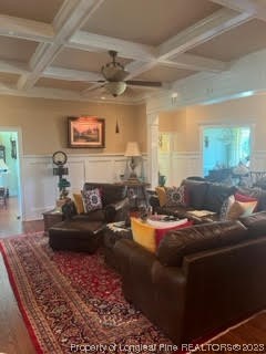 6565 Maxwell Road Stedman, NC 28391 - Photo 15 of 48 a living room with furniture and a chandelier