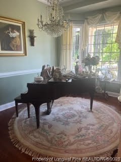 6565 Maxwell Road Stedman, NC 28391 - Photo 43 of 48 a room with furniture and a chandelier