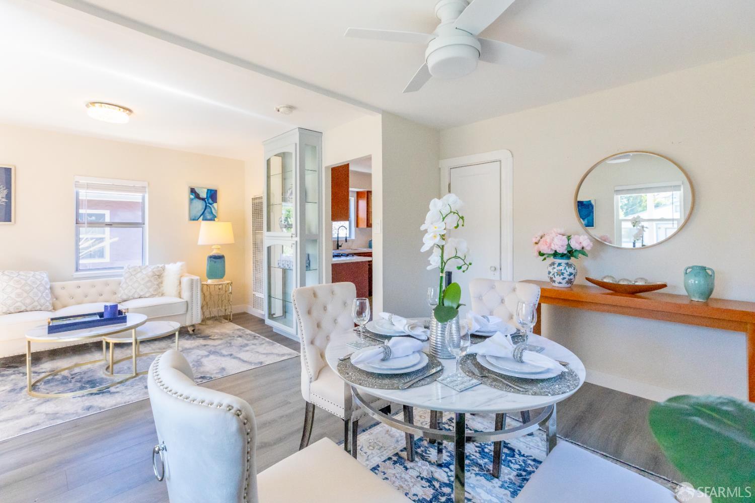 808 Fourth Street Rodeo, CA 94572 - Photo 11 of 70 a view of a dining room with furniture and wooden floor