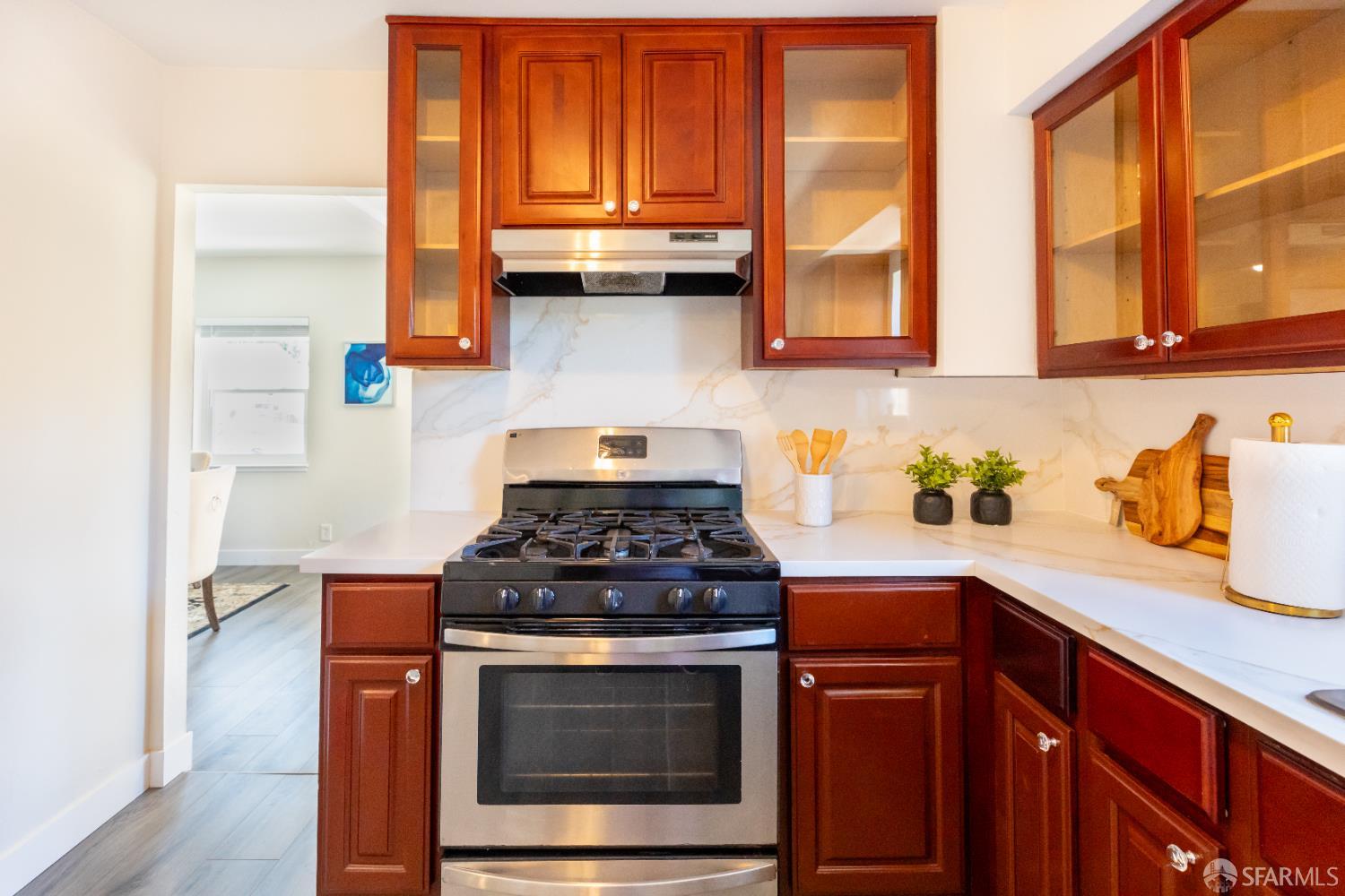 808 Fourth Street Rodeo, CA 94572 - Photo 14 of 70 a kitchen with stainless steel appliances granite countertop wooden cabinets stove top oven and sink