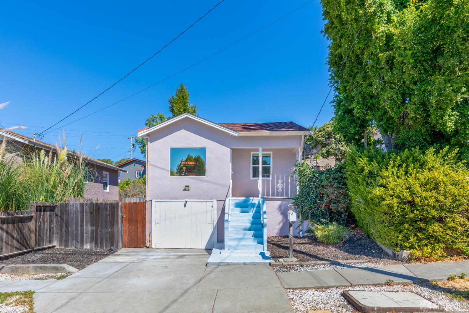 808 Fourth Street Rodeo, CA 94572 - Photo 2 of 70 a front view of a house with a yard