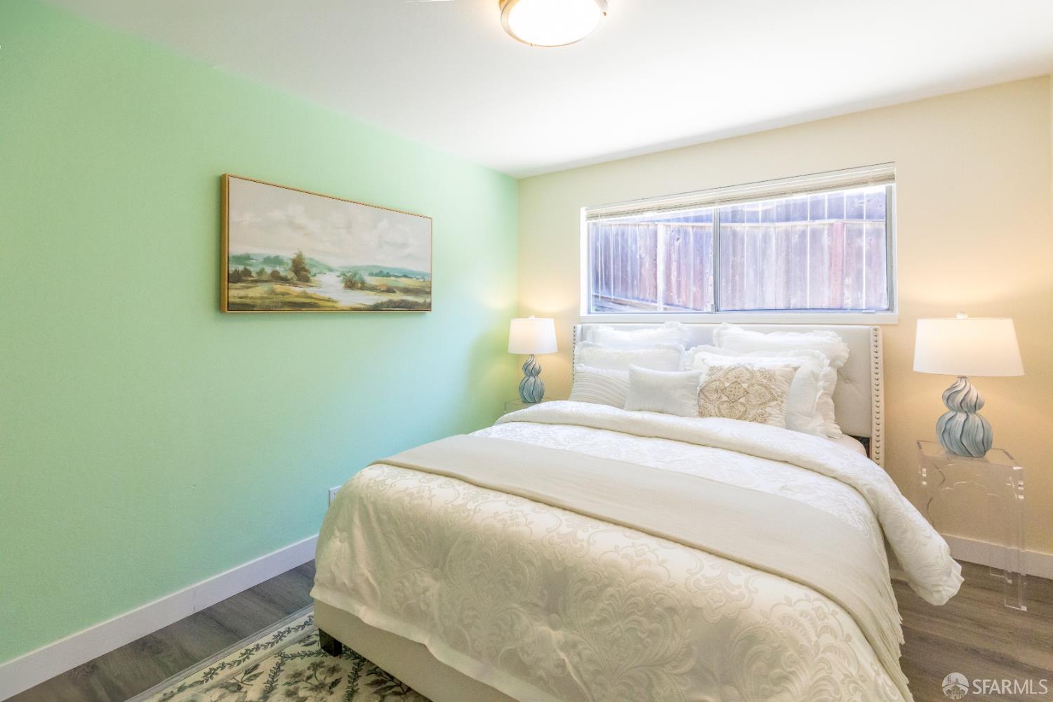 808 Fourth Street Rodeo, CA 94572 - Photo 29 of 70 a bedroom with a bed and a window