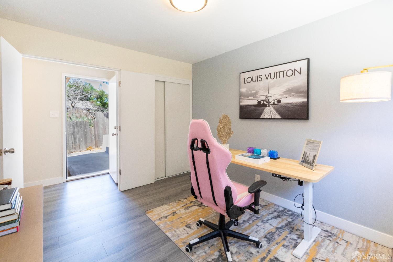 808 Fourth Street Rodeo, CA 94572 - Photo 44 of 70 a workspace with furniture and wooden floor