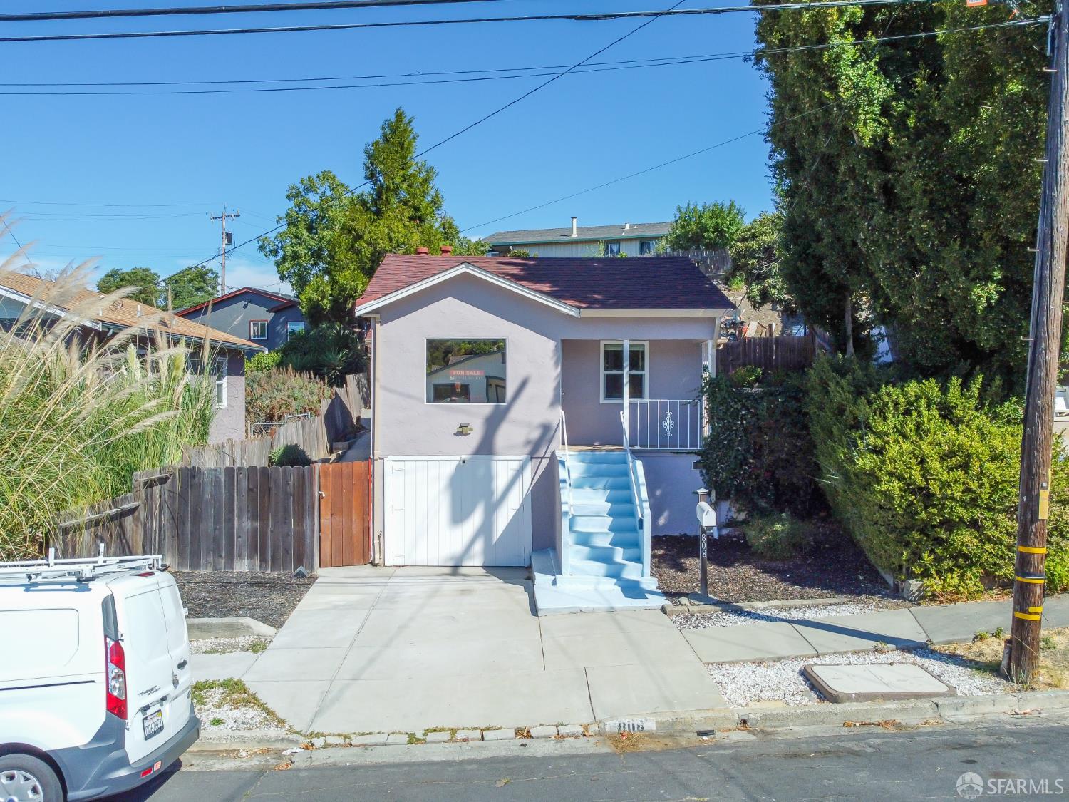 808 Fourth Street Rodeo, CA 94572 - Photo 5 of 70 a front view of a house with a yard