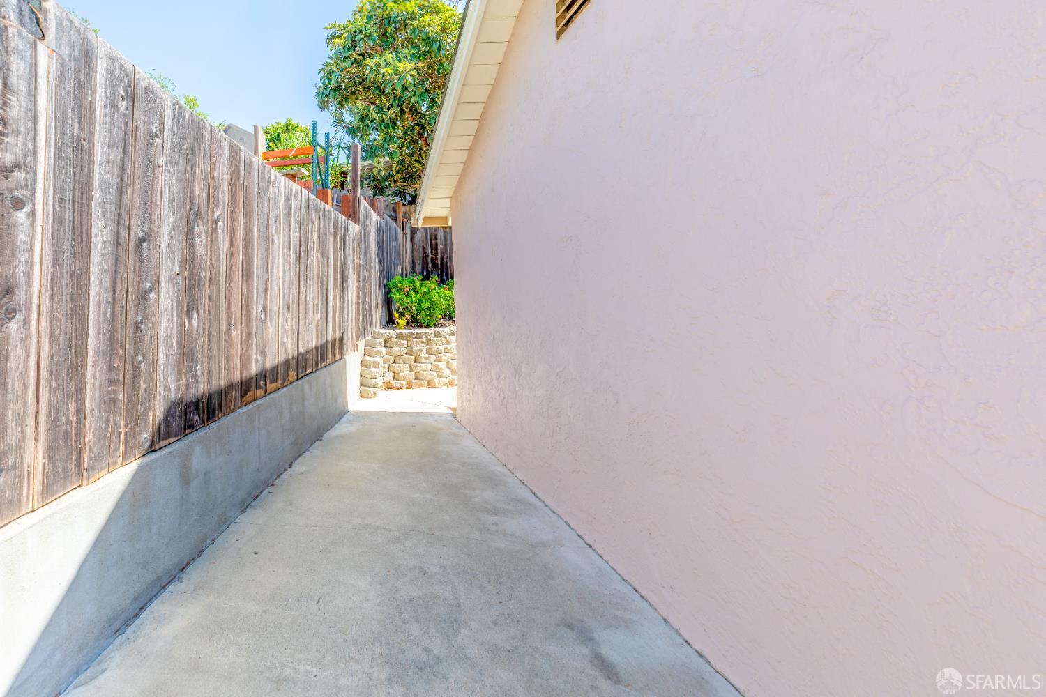 808 Fourth Street Rodeo, CA 94572 - Photo 56 of 70 a view of a pathway of a wooden fence