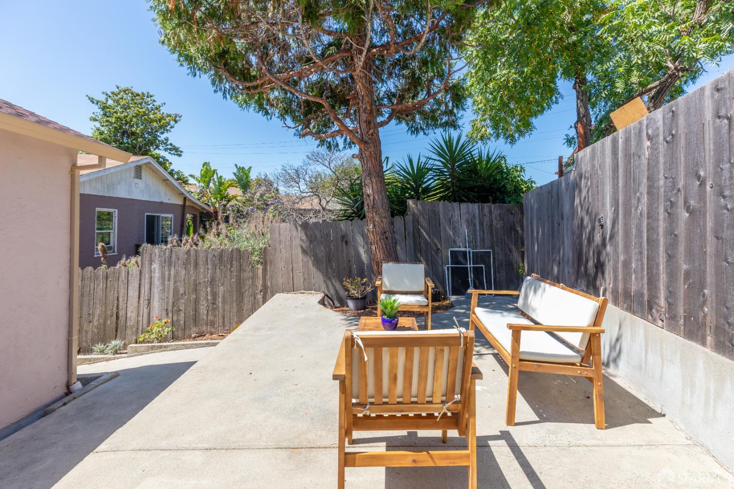808 Fourth Street Rodeo, CA 94572 - Photo 60 of 70 a view of outdoor sitting area with furniture and wooden fence