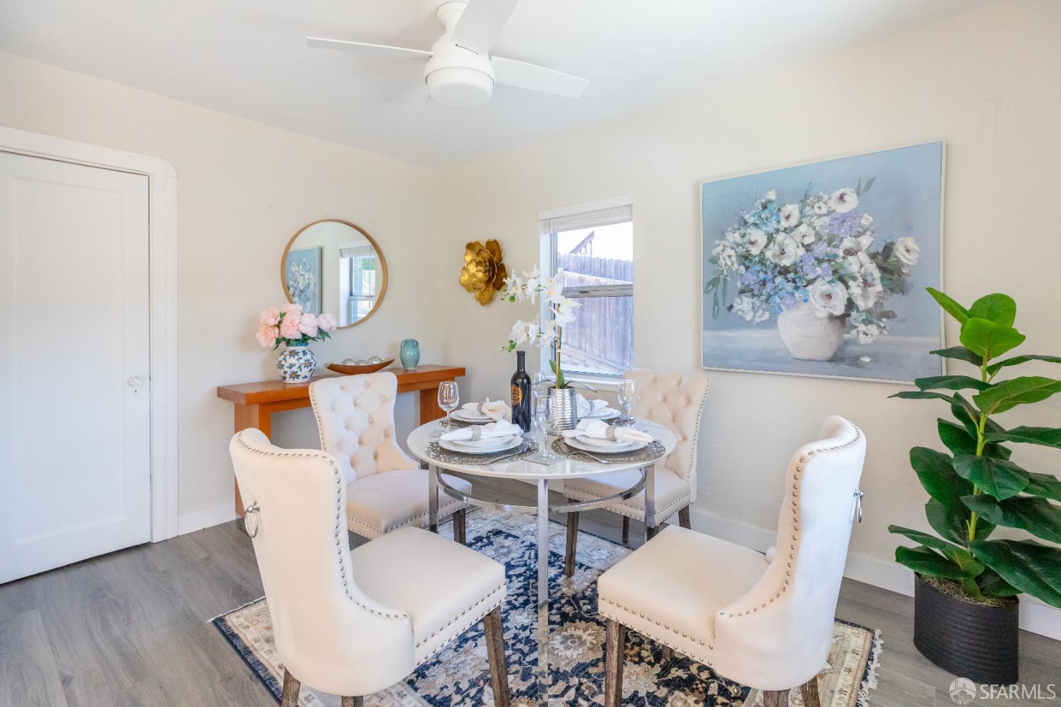 808 Fourth Street Rodeo, CA 94572 - Photo 9 of 70 a view of a dining room with furniture and wooden floor