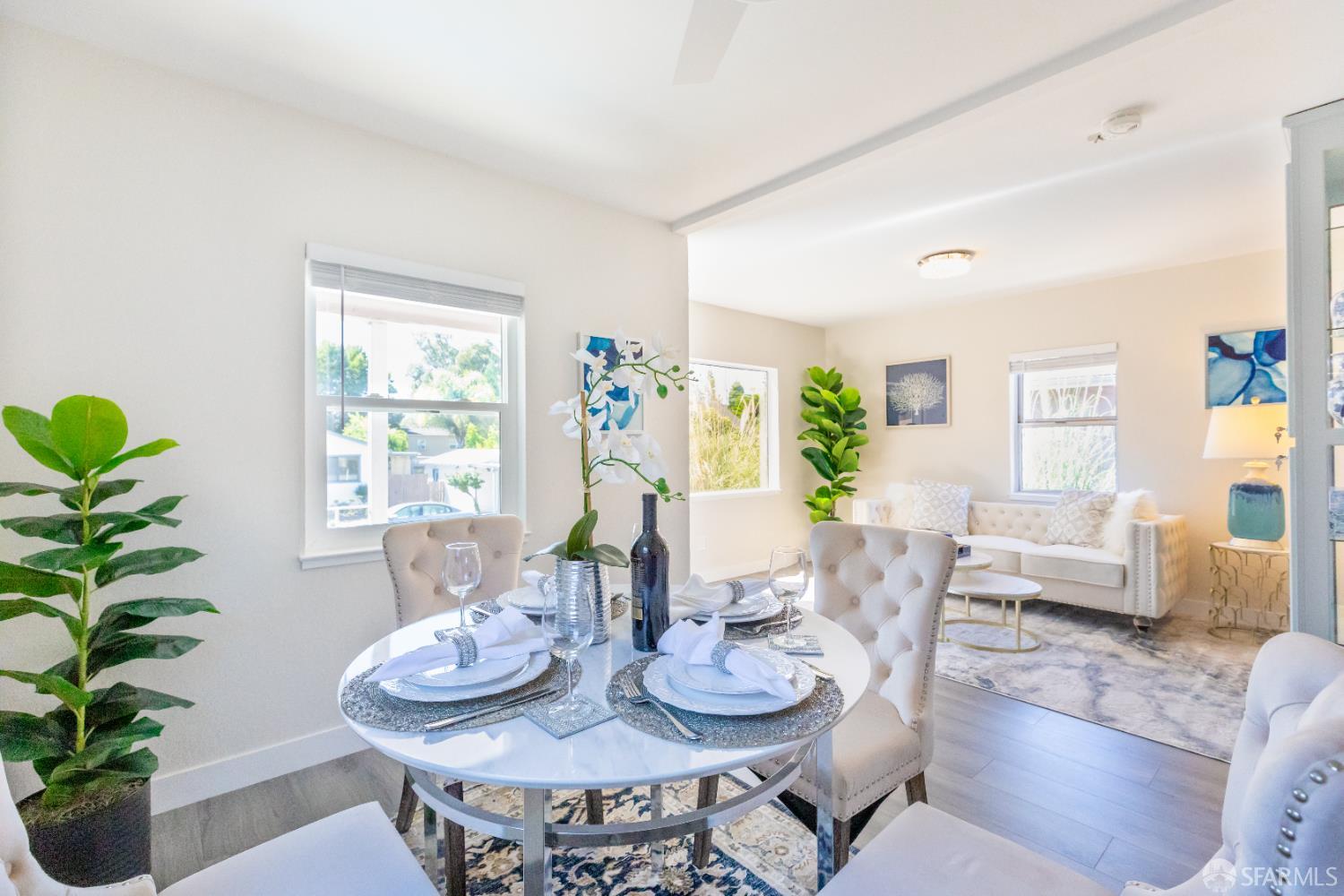 808 Fourth Street Rodeo, CA 94572 - Photo 10 of 70 a view of a dining room with furniture window and wooden floor