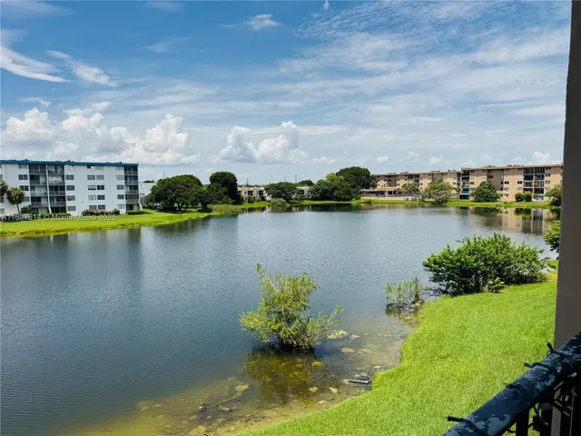 a view of a lake with a city