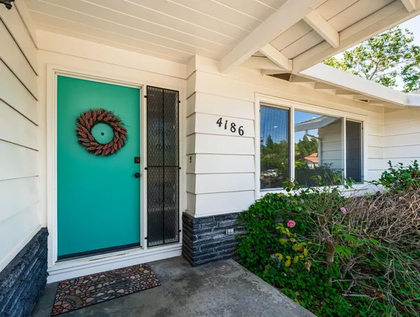 a view of a entryway door front of house