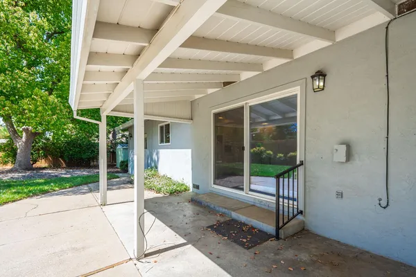 a house view with a outdoor space