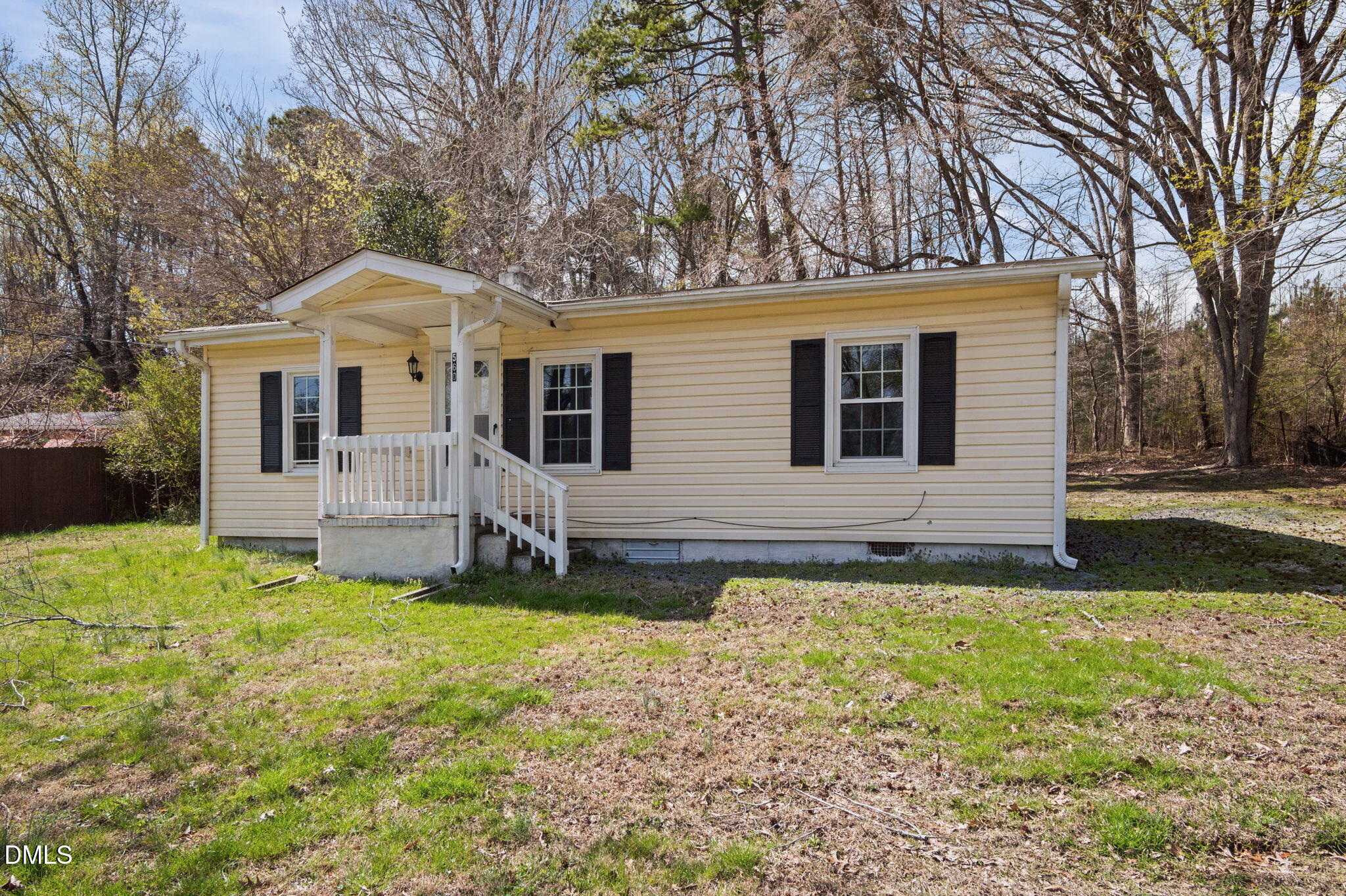 560 Harper Road Hillsborough, NC 27278 - Photo 1 of 44 a front view of a house with a yard