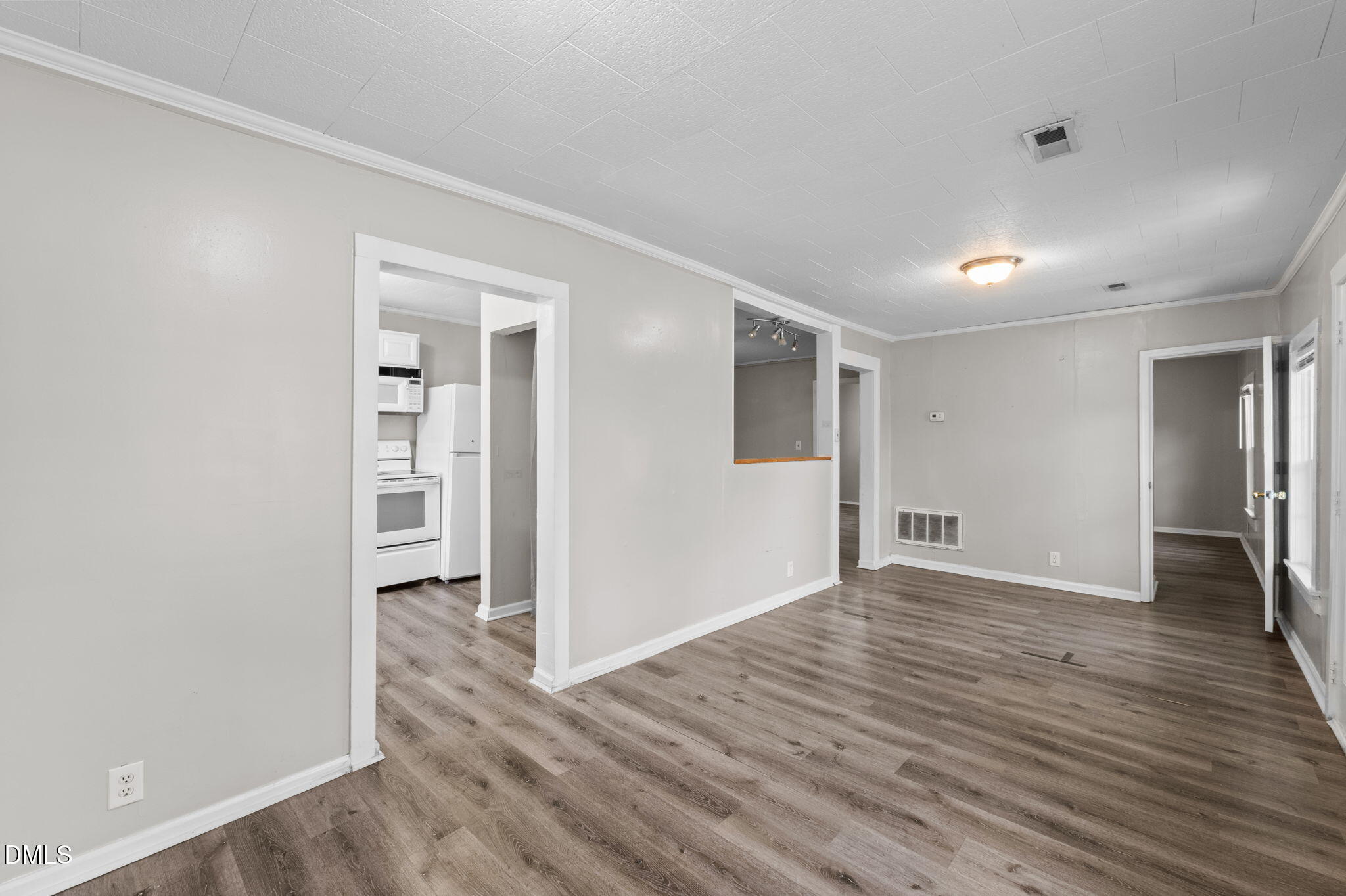 560 Harper Road Hillsborough, NC 27278 - Photo 13 of 44 wooden floor in an empty room with a window