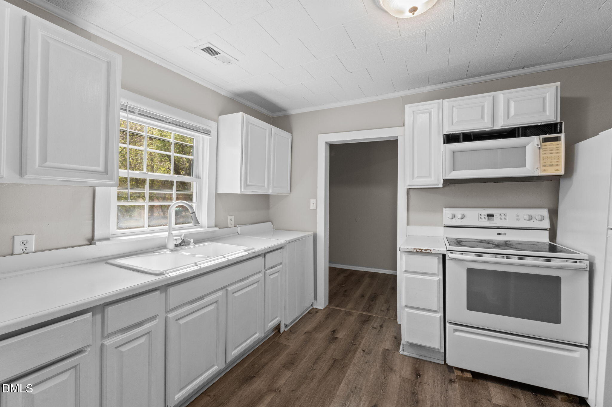 560 Harper Road Hillsborough, NC 27278 - Photo 14 of 44 a kitchen with a stove oven and sink