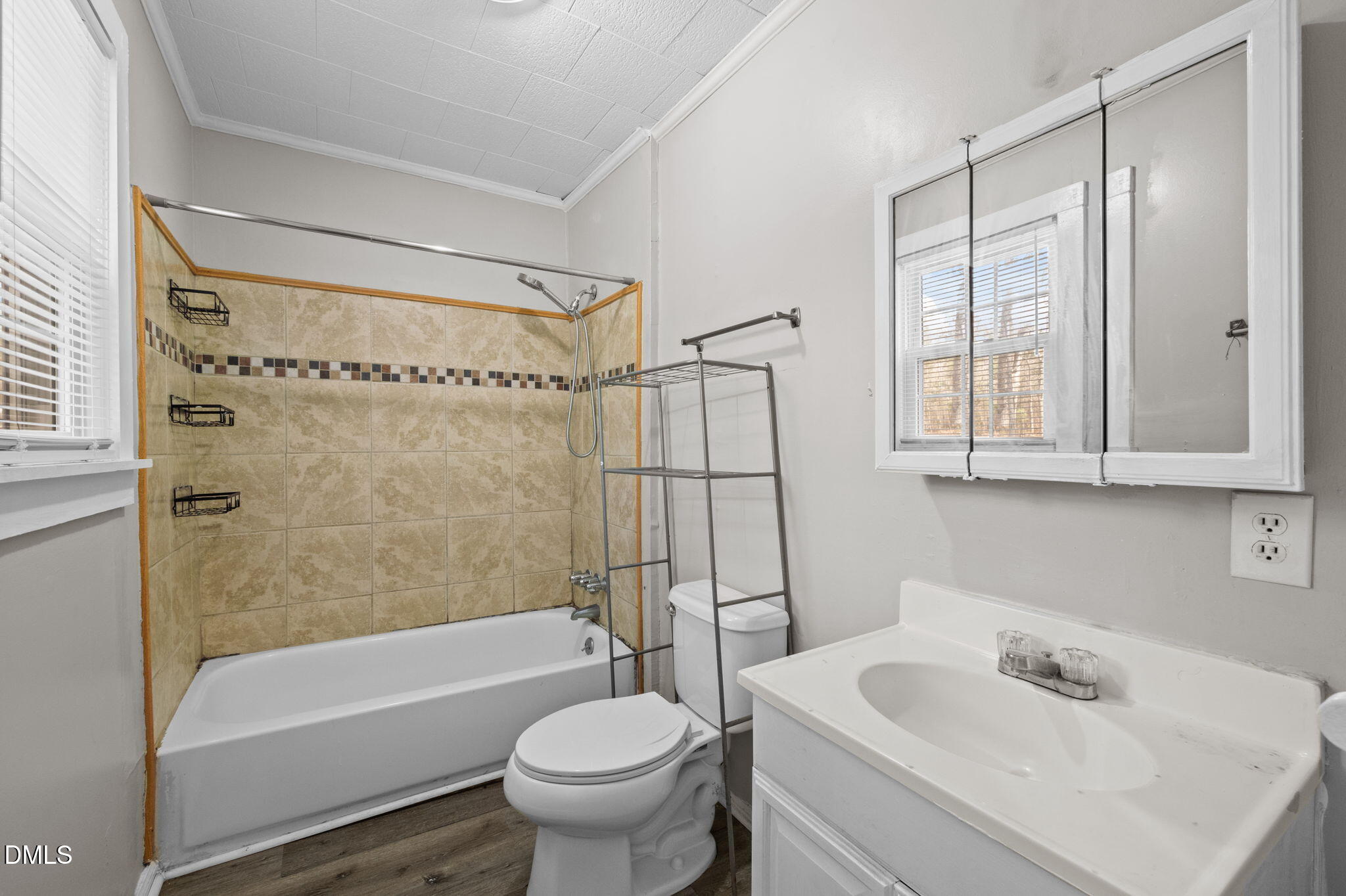 560 Harper Road Hillsborough, NC 27278 - Photo 19 of 44 a bathroom with a sink toilet and shower