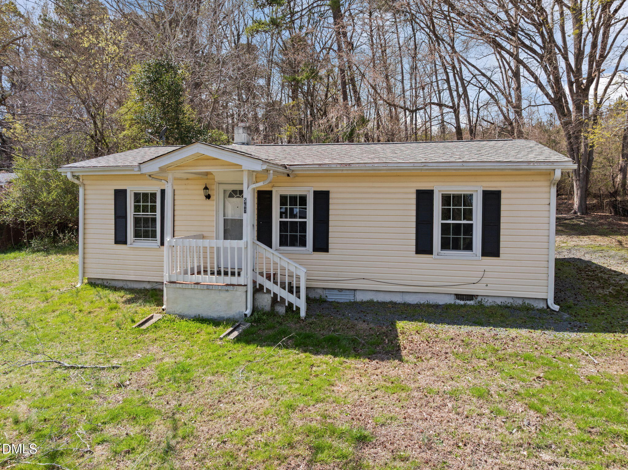 560 Harper Road Hillsborough, NC 27278 - Photo 2 of 44 a front view of a house with a yard