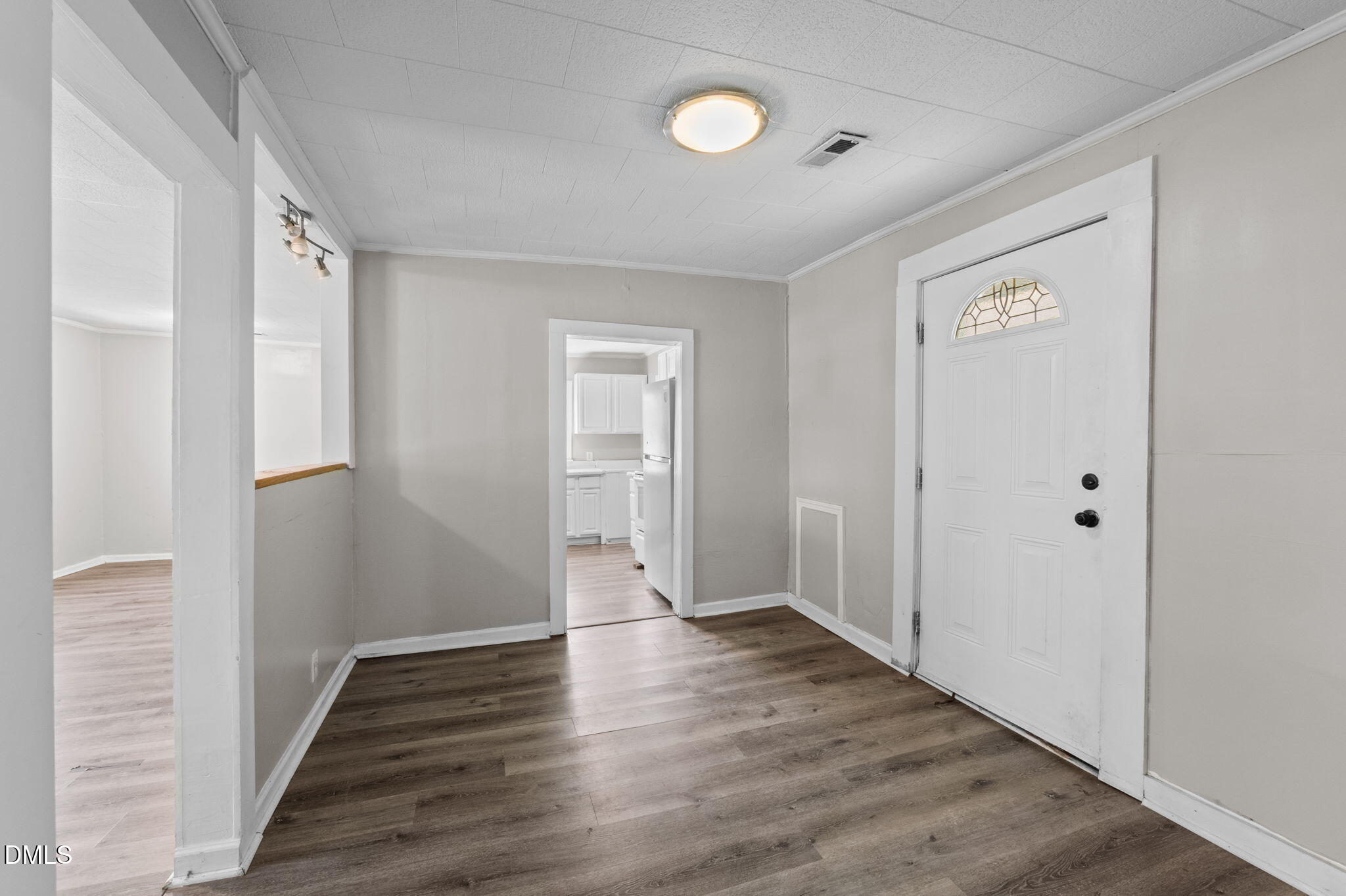 560 Harper Road Hillsborough, NC 27278 - Photo 21 of 44 a view of a hallway with wooden floor