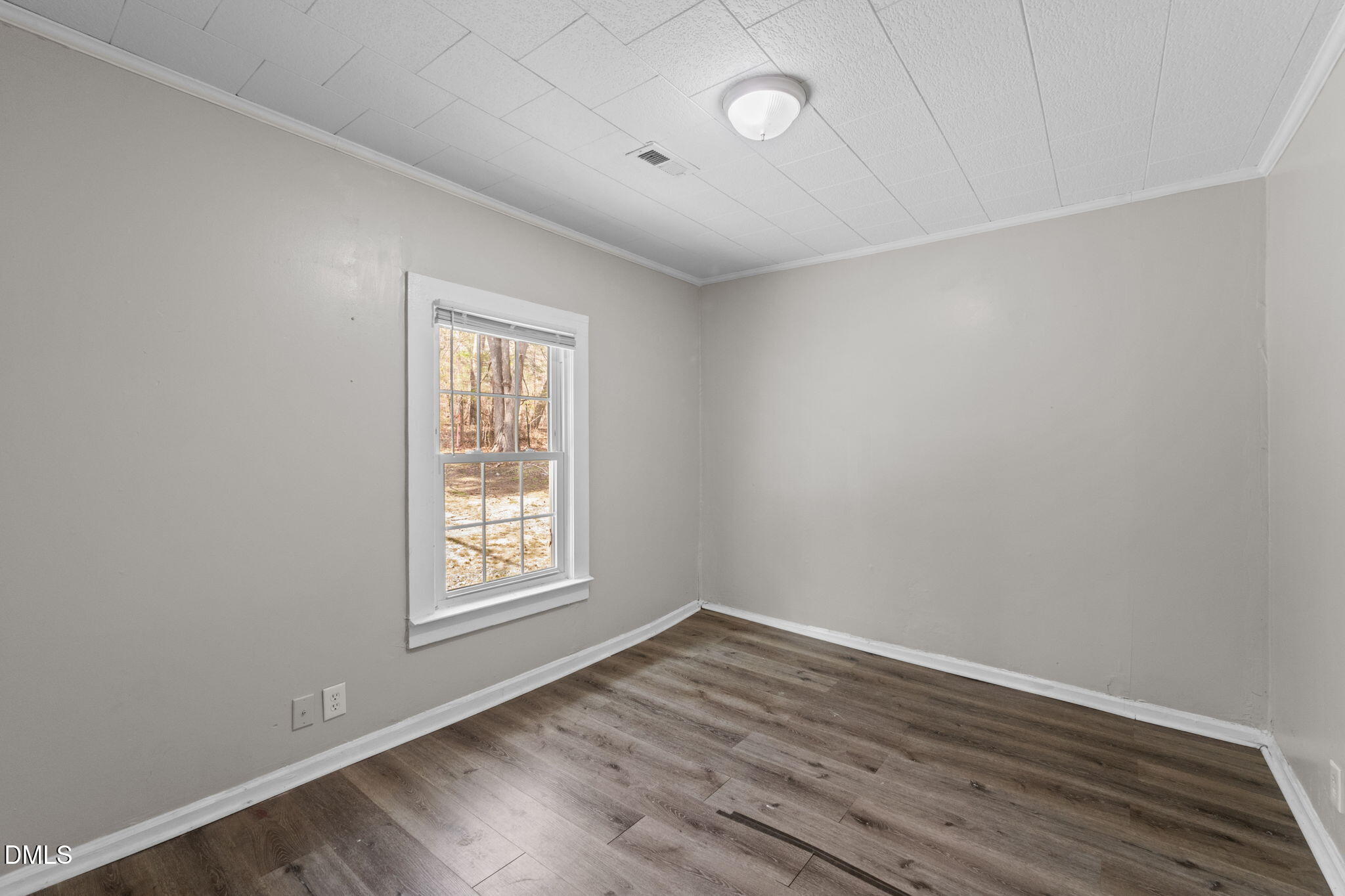 560 Harper Road Hillsborough, NC 27278 - Photo 22 of 44 wooden floor in an empty room with a window