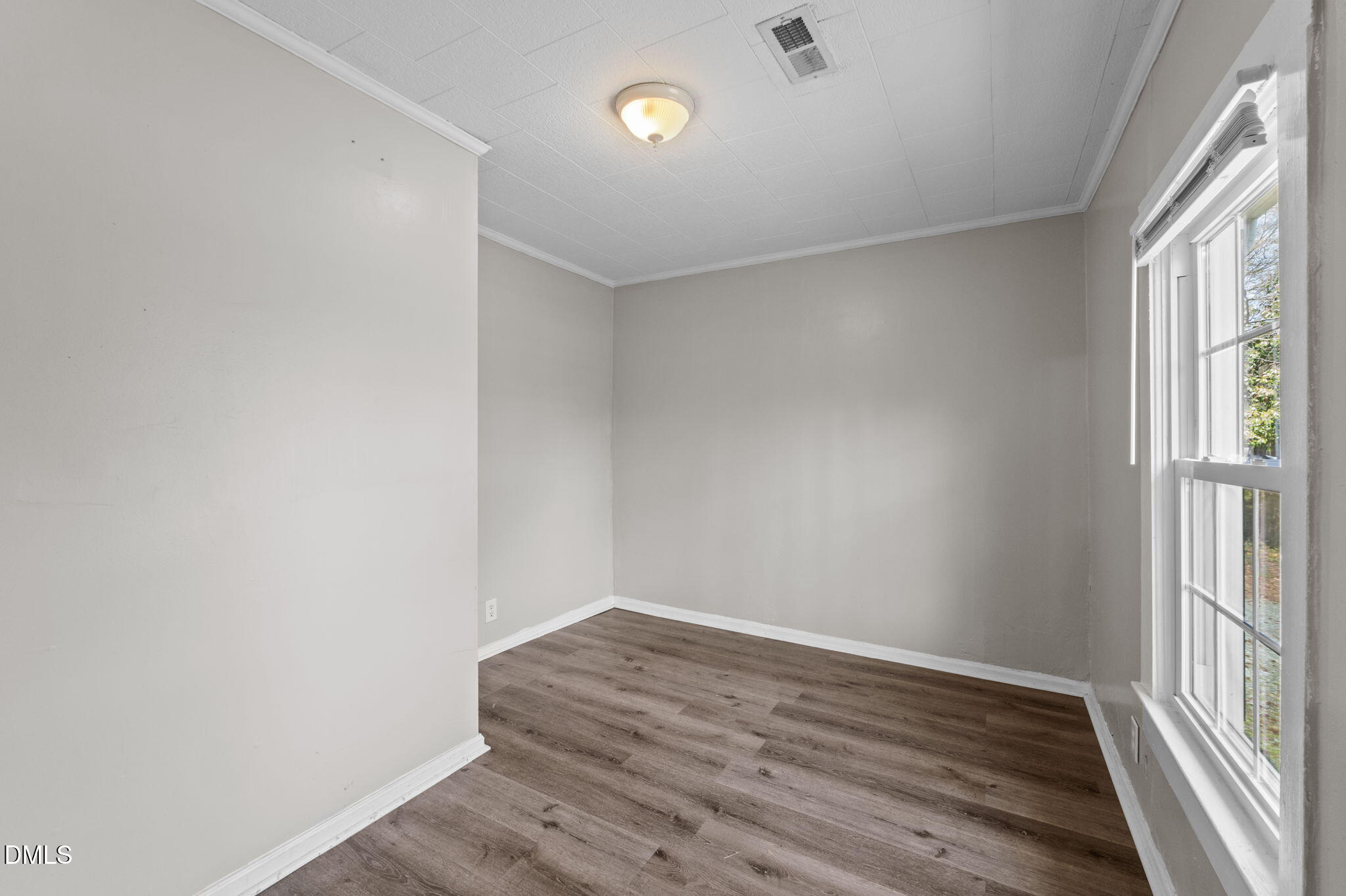 560 Harper Road Hillsborough, NC 27278 - Photo 24 of 44 wooden floor in an empty room with a window