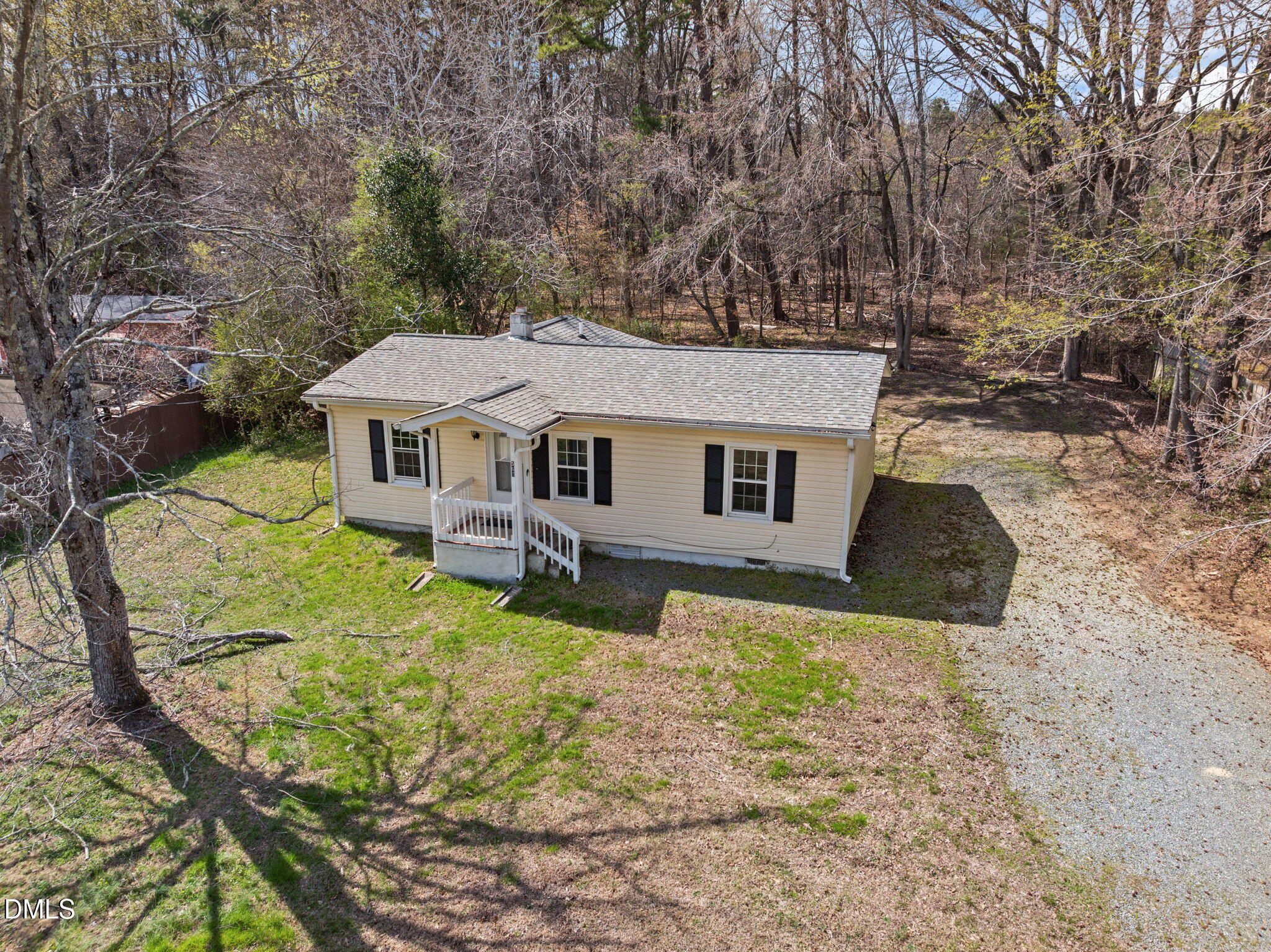 560 Harper Road Hillsborough, NC 27278 - Photo 3 of 44 a aerial view of a house with yard and trees